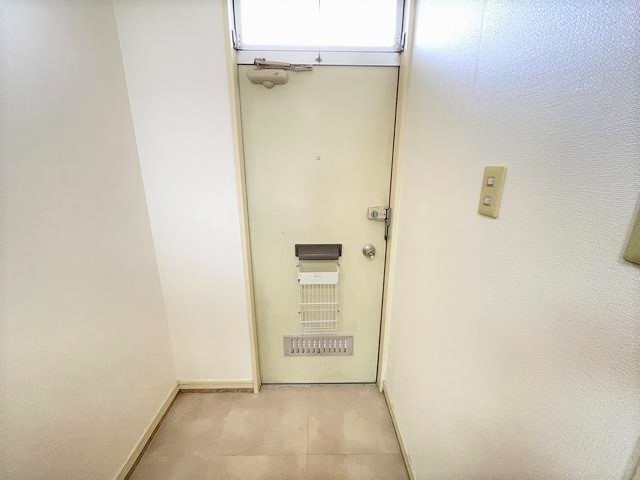 メゾン米野木 玄関